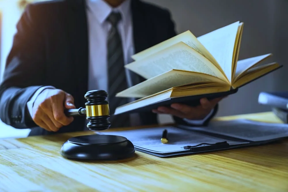 Expungement lawyer reading relevant laws of expungement